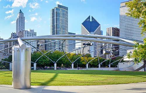 Park with metal structure overlooking chicago buildings near Hotel Chicago Downtown, Autograph Collection