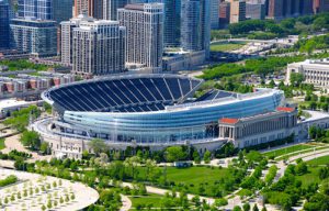 Aerial shot of sports stadium in front of buildings near Hotel Chicago Downtown, Autograph Collection